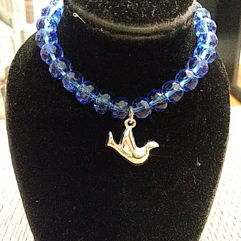 Avon stretch color charm bracelet dove